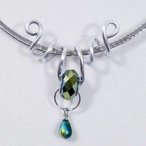 Aluminum Silver Spiral Pendant Green Facet Bead